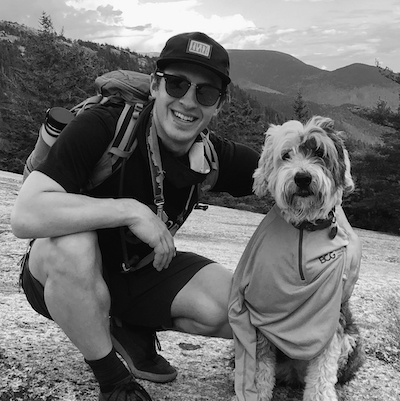 Dave and his fluffy Old English Sheepdog Panda out for a hike in New Hampshire.